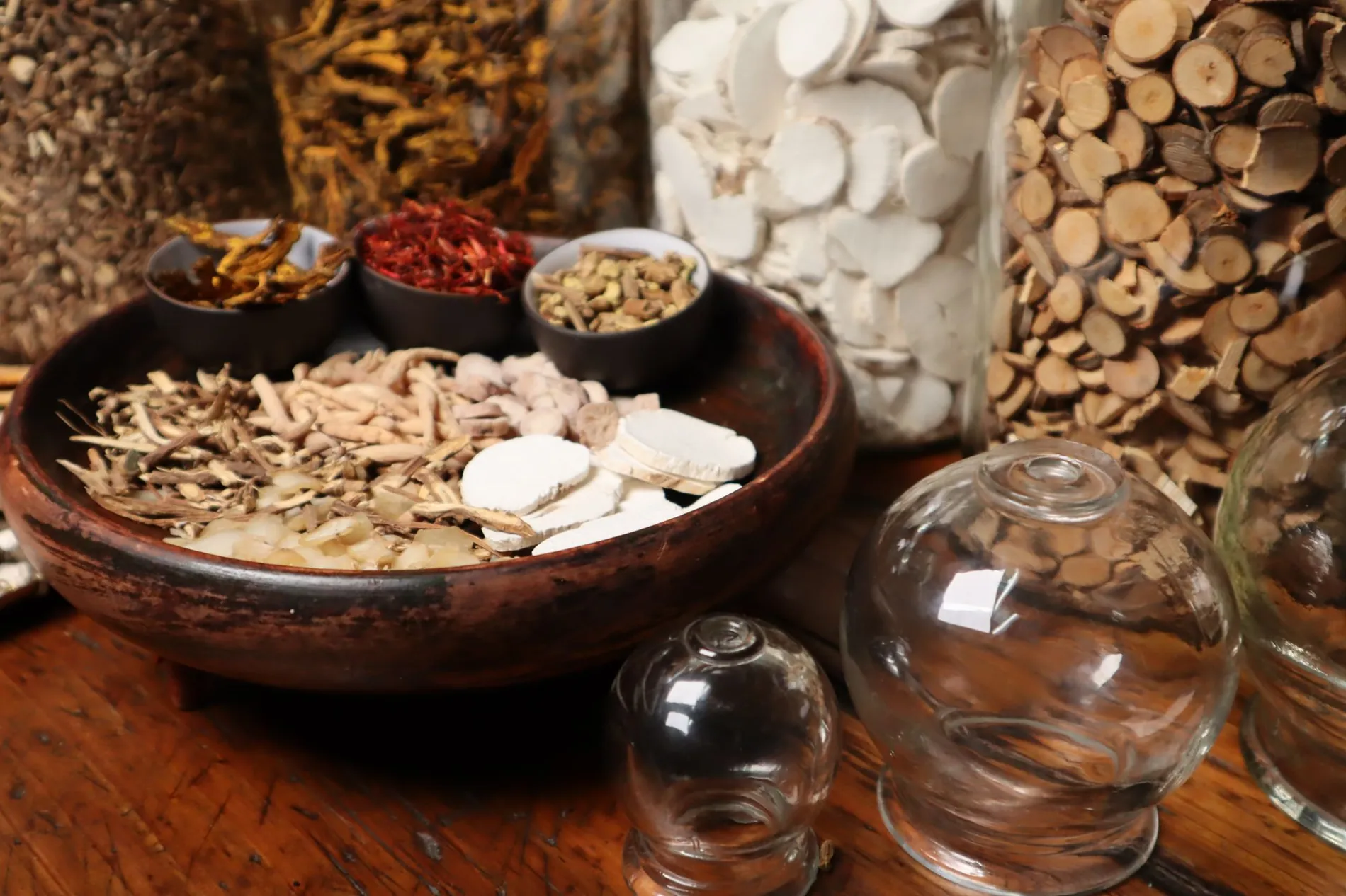 Bowls of dried herbs and botanicals